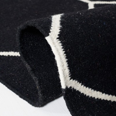 Handmade Black Geometric Wool 6' x 9' Flat Woven Rug