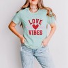 Simply Sage Market Women's Love Vibes Heart Checkered Short Sleeve Graphic Tee - 2 of 4