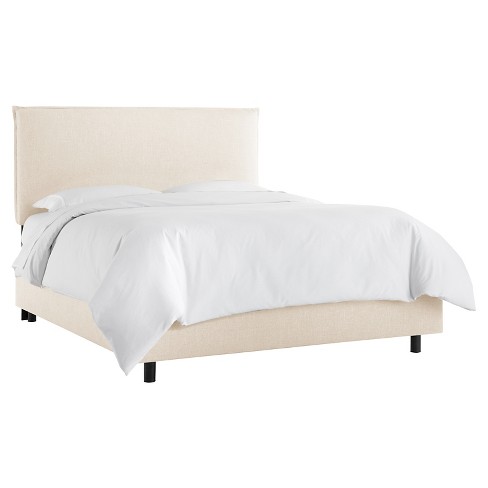 white linen slipcover bed