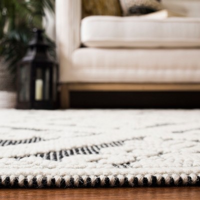 Ivory and Black Hand-Knotted Wool 4' x 6' Area Rug