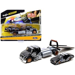 International DuraStar Flatbed Truck #22 and 1988 Ford Mustang LX #22 Matt Black w/Gray Graphics 1/64 Diecast Models by Maisto - 1 of 3