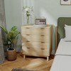 Yukimo 27.6" Natural Wood 4-Drawer Dresser, Fluted Chest of Drawers with Gold Finger Pulls and Wood Legs for Bedroom - 2 of 4