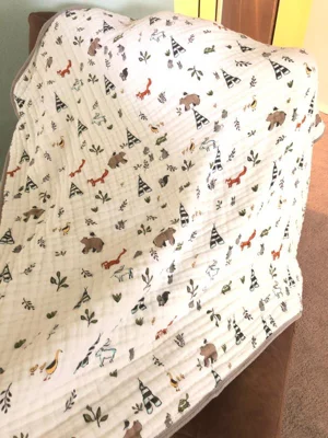 user image by Stephanie, Little Unicorn Cotton Muslin Quilt Blanket