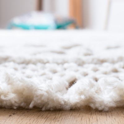 Ivory Elegance 6' x 9' Tufted Wool-Cotton Blend Shag Area Rug