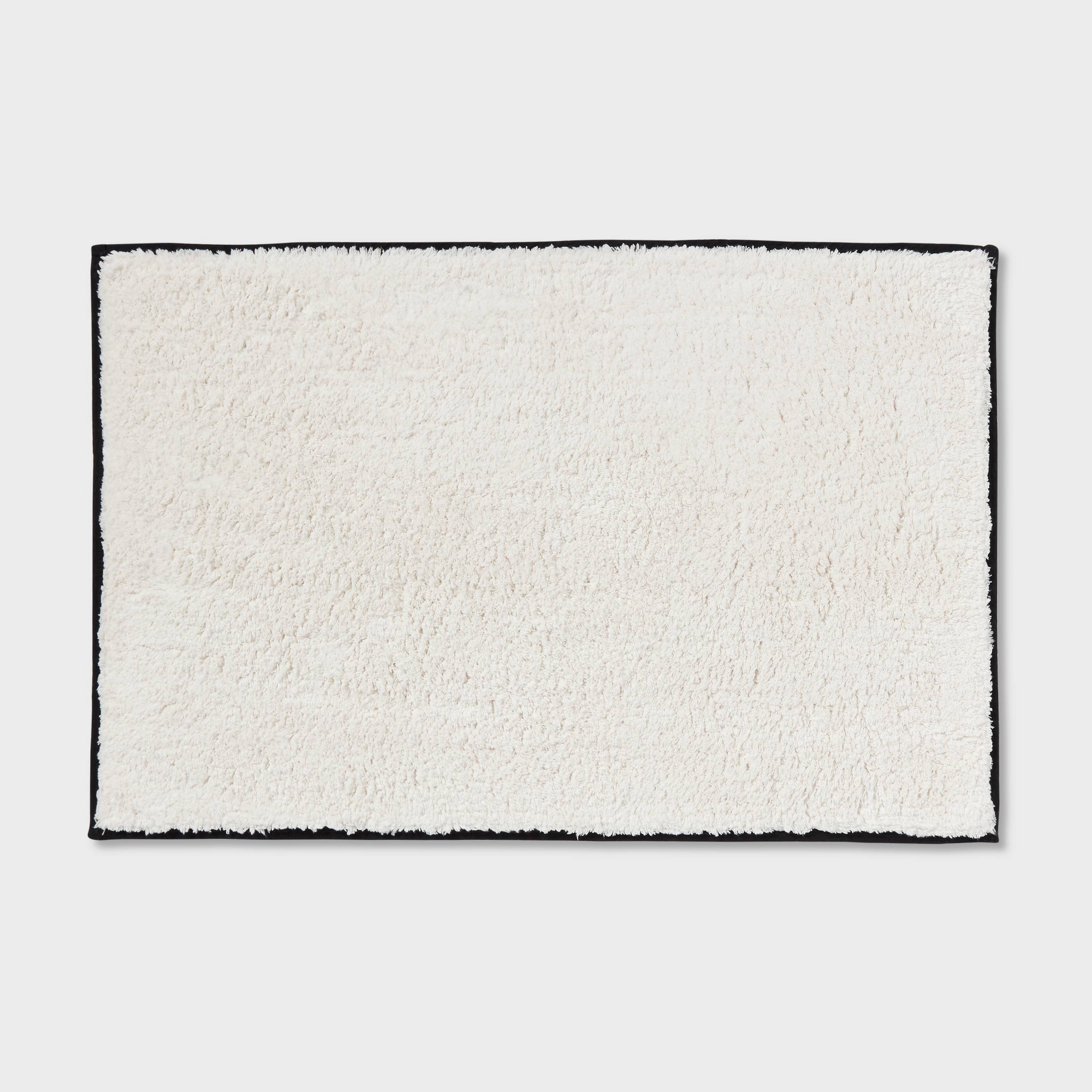 24"x36" Cut Pile Bath Rug Ivory wBlack Stitch Boarder - Threshold™