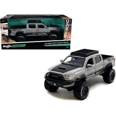 2023 Toyota Tacoma TRD PRO Off Road Truck Cement Gray with Black Hood and Roofrack 1/27 Diecast Model Car by Maisto