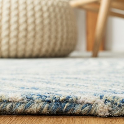 Blue and Ivory Floral Hand-Tufted Wool Area Rug, 4' x 6'
