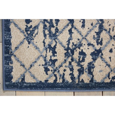 Ivory and Navy Blue Medallion 2'2" x 7'6" Synthetic Area Rug