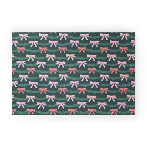 KrissyMast Christmas Garland with Bows Small Welcome Mat - Deny Designs - 1 of 3