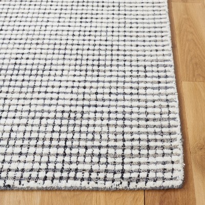 Ivory Round Handmade Tufted Wool Abstract Rug