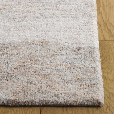 Ebony EBN221 Handmade Tufted Rug - Safavieh