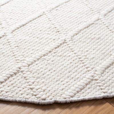 Ivory Round Handwoven Wool and Viscose Area Rug