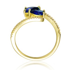 Guili Elegant Sterling Silver 14K Gold-Plated Bypass Ring with Emerald Cubic Zirconia for a Chic, Timeless Sparkle. Green or Blue, Sizes 6-8. - 1 of 3