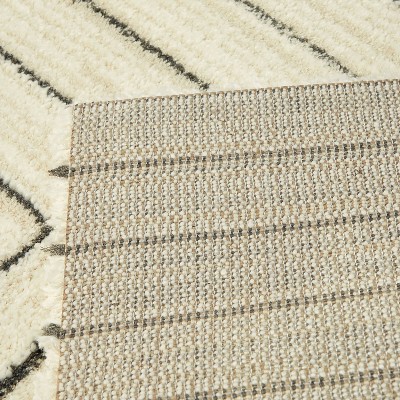 Carmody Cream and Black Geometric Synthetic Runner Rug
