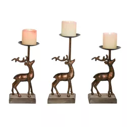 Transpac Metal 13 in. Bronze Christmas Reindeer Pillar Candle Holders Set of 3