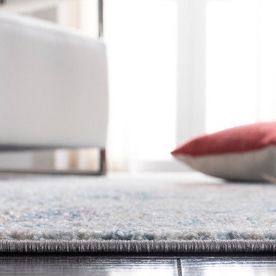 Light Blue and Ivory Square Synthetic Area Rug