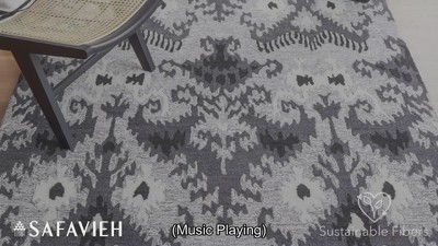 Handmade Black Wool Ikat Tufted Rectangular Rug