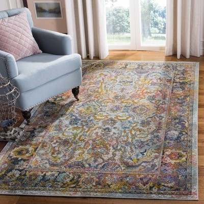 Light Blue and Orange Synthetic Floral Motif Area Rug