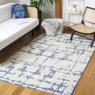 Handmade Blue and Ivory Wool Tufted 4' x 6' Rug