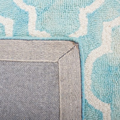 Turquoise and Ivory Hand-Tufted Wool Area Rug 4' x 6'