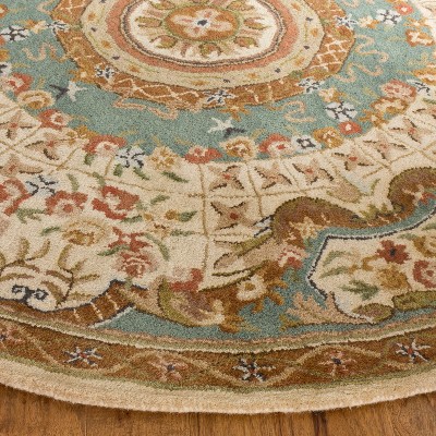 Elegant Ivory Oval Hand-Tufted Wool Area Rug, 7'6" x 9'6"