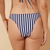 Women's Striped Low-Rise Super Cheeky Reversible Bikini Bottom - Wild Fable™ White/Navy Blue/Pink - 3 of 4