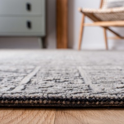 Handmade Black and Gray Wool Round Tufted Area Rug