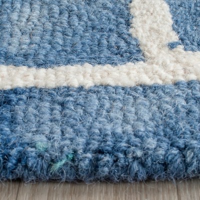 Blue and Ivory Round Hand-Tufted Wool Area Rug