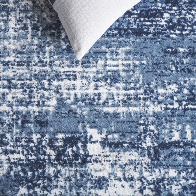 Ivory and Blue Abstract Round Synthetic Area Rug
