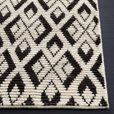 Hand-Knotted Black and Ivory Wool Area Rug, 5' x 8'