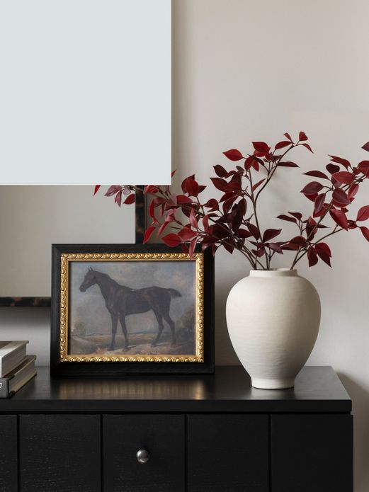 Horse painting decor and faux vased stems on entry console