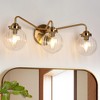 LNC Amarantiser 22-in 3-Lights Polished Gold with Clear Glass Modern/Contemporary Bathroom Vanity Lights - 2 of 4