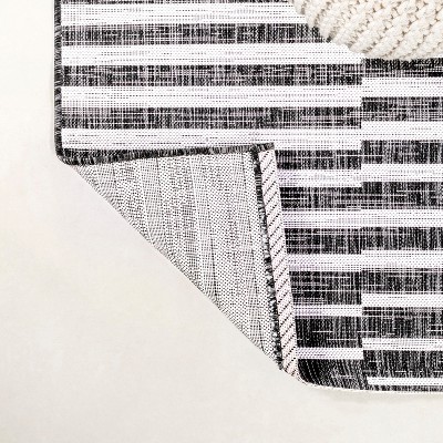 Ivory and Black Stripe Synthetic 8' x 10' Easy-Care Rug