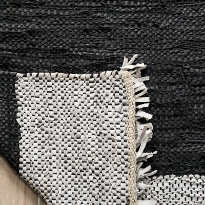 Handmade Light Grey and Black Cowhide Area Rug