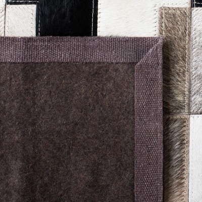 Handmade Black and Ivory Geometric Cowhide Area Rug, 3' x 5'