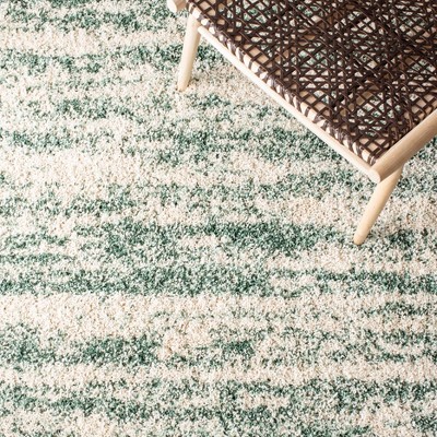 Ivory and Green Round Shag Synthetic Area Rug