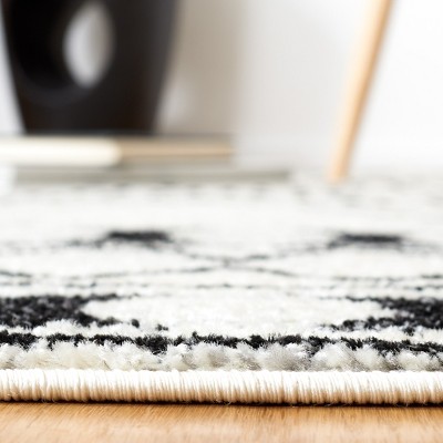 Boho-Chic Black and Ivory Hand-Knotted Round Area Rug