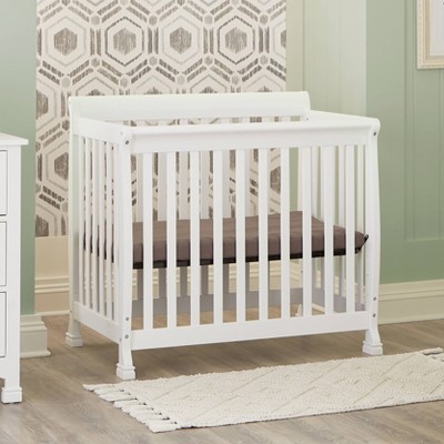 White Wooden 4-in-1 Convertible Mini Crib and Dresser Set
