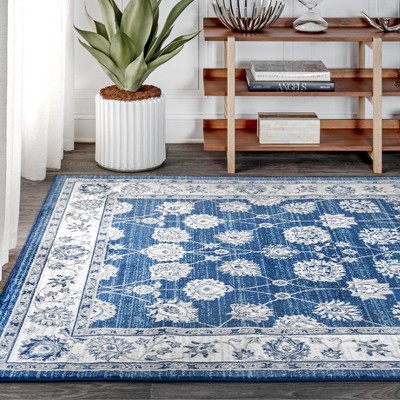 Ivory and Blue Floral Synthetic 4' x 6' Area Rug