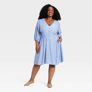a line midi dresses with short sleeves Berrylush Women Solid Purple Bell Sleeves A-Line Mini Dress main image 0