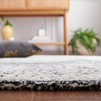 Handmade Black and Ivory Wool Tufted Square Rug