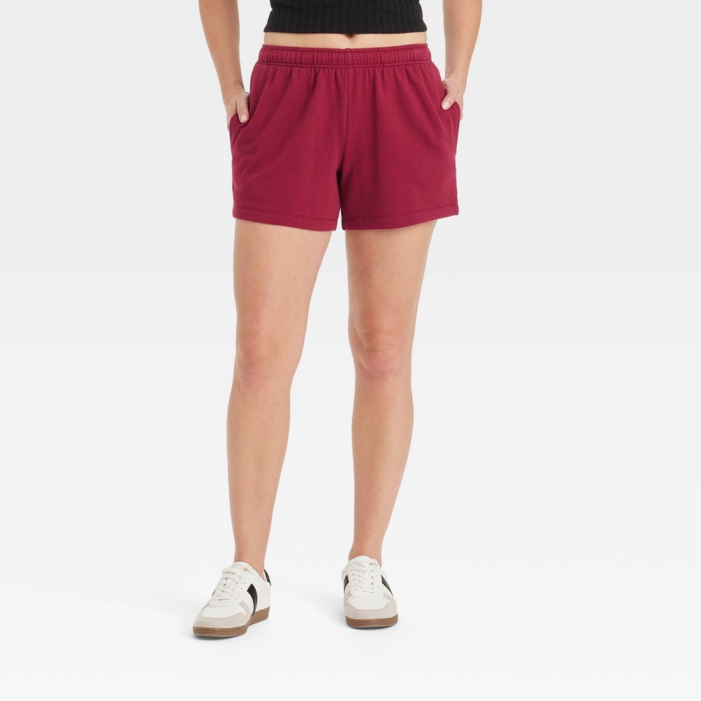 Women's Leisure Studio Mid-Thigh Fleece Shorts - Universal Thread™ Maroon XS