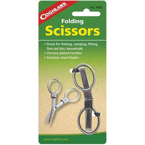 Travel scissors with silicone holder