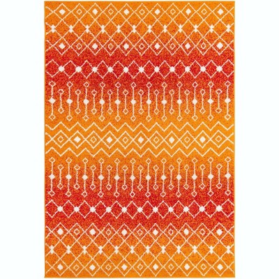 6' x 9' Orange and Red Synthetic Trellis Area Rug
