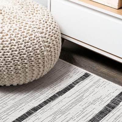 Ivory and Black Striped Synthetic 4' x 6' Indoor/Outdoor Rug