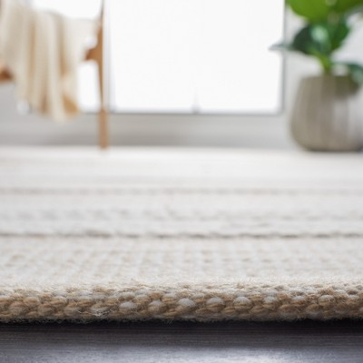 Ivory and Tan 8' x 10' Flat Woven Wool Rug