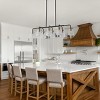 Dewdrop Modern Industrial 8-Light Island Pendant Light, Black and Brass Linear Fixture with Hammered Glass Shades - 4 of 4