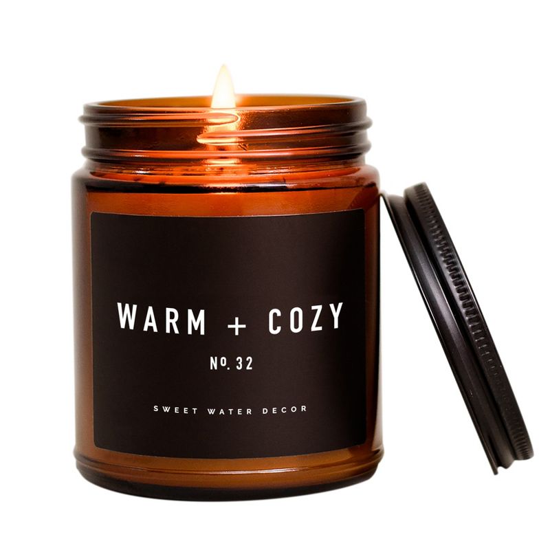 Sweet Water Decor Warm and Cozy 9oz Amber Jar Soy Candle, 1 of 6