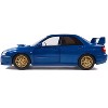 2003 Subaru Impreza WRX STI RHD (Right Hand Drive) Sonic Blue Metallic with Gold Wheels 1/18 Diecast Model Car by Solido - 2 of 4