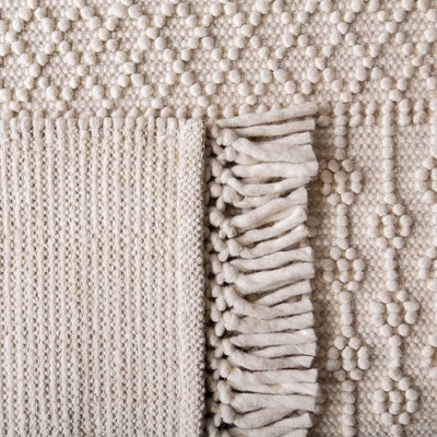 Ivory Coast Artisan Hand-Tufted Wool Rug - 5' x 8'